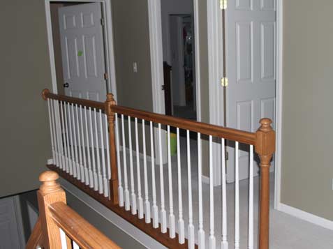 Old wood spindles replace with iron ones