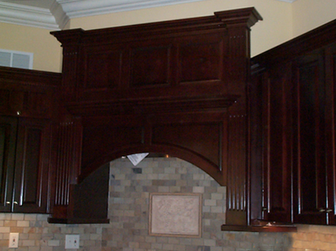 Stove Hood Upper with Raised Panel Radius, Fluted Columns, Raised Panel Spanner, Crown Pediment, and Mantle Ledge