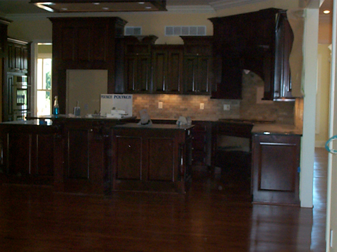 Designs of this kitchen included Fluted Trim Pieces, Columns on Island, and a 'Scene' from any angle worthy of a photo