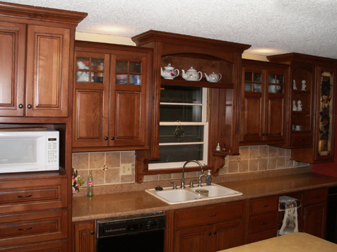 Custom Cabinets with Bump Ups and bump outs on Upper Cabinets
