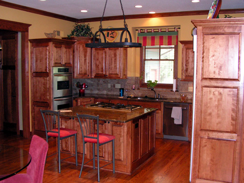 Island has doors on back side for additional storage