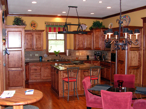 Custom Kitchen Cabinets with Lazy Susan Corner Uppers, Raised Panel Ends, Island with Cooktop - Birch Wood Type