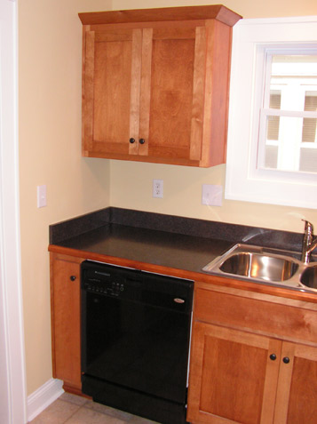 Shaker Crown - example of Crown overlapping Window Trim to maximize Cabinet Width