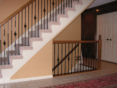 Wrot iron spindles - color is satin black - pattern is single twist/single basket/single twist plus 5 butterfly spindles in selected locations