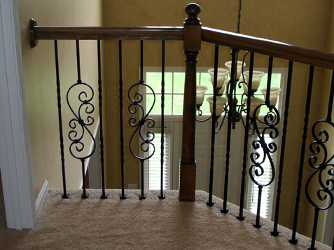 Iron Spindles replace wood balusters Overland Park, Kansas