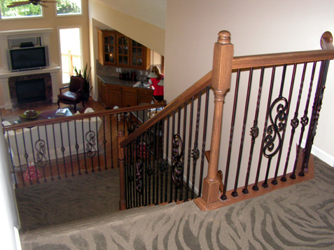 Iron Spindles update and transform this staircase
