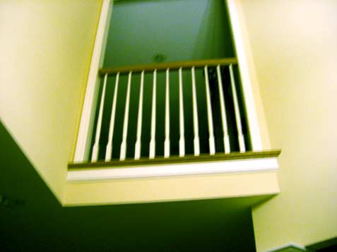 balcony with standard painted wood spindles