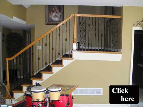 Updated Staircase with Iron Spindles, Wood Stair Treads