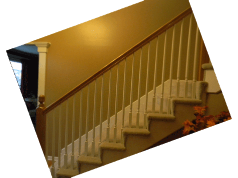 Staircase with old spindles and dated look