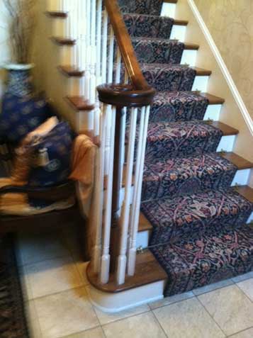 Staircase with old spindles and dated look