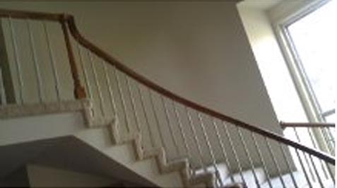 Staircase with old spindles and dated look