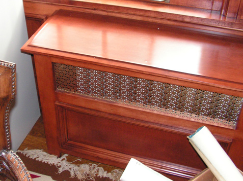 Period-Style Radiator Cover to match Wainscot Paneling done by our Trim Carpenters